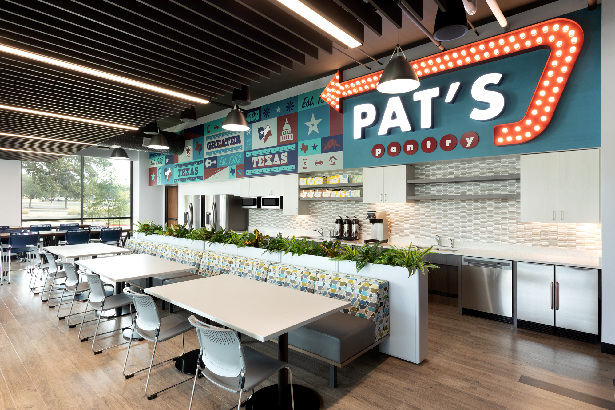 Pat's Pantry dining area with tables, chairs and benches