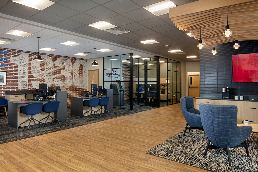 credit union workspace with desks and chairs