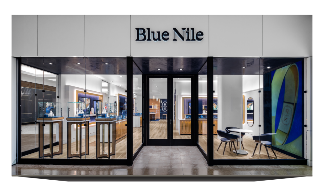 storefront of Blue Nile retail space with branded interior spaces