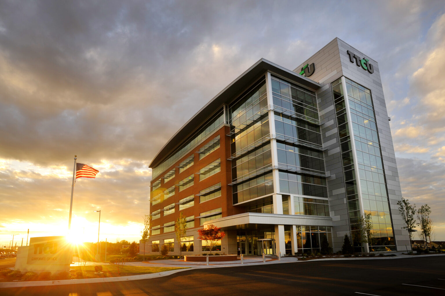 State of the art workplace building with the sun setting
